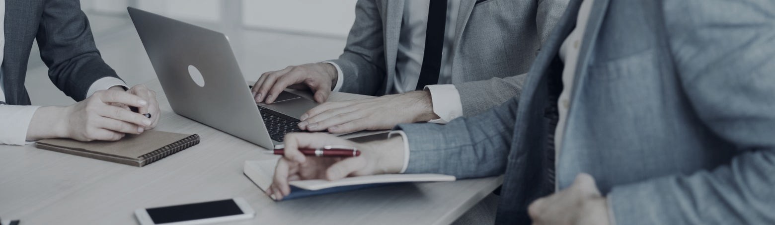 Working through financial statements at a desk